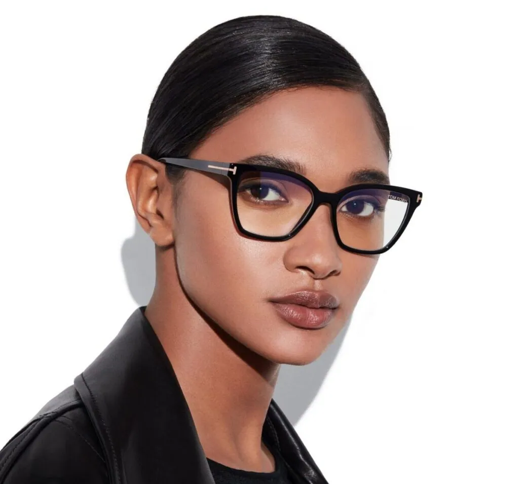 Woman wearing black cat-eye Tom Ford frames